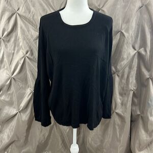 Capsule black sweater with bell sleeves